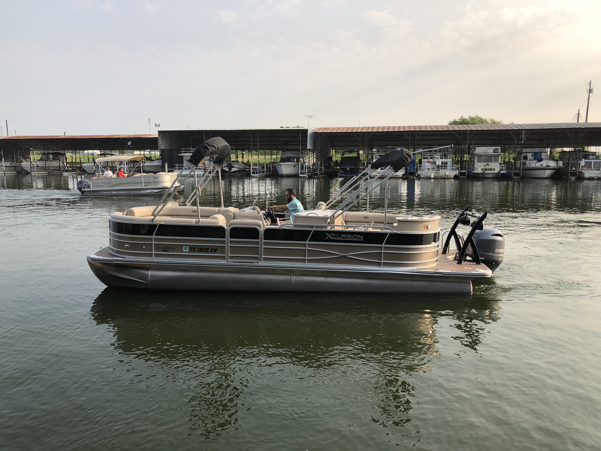 Berkshire Xcursion pontoon on the water